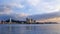 Time lapse of clouds formation over Siracha cityscape at seaside