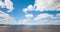 Time lapse of clouds forming over a lake.