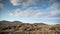 Time lapse of clouds over desert Timanfaya National Park.