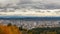 Time lapse of clouds over Portland OR cityscape in colorful fall season 4k uhd