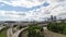 Time lapse of clouds over Seattle WA city skyline and interstate freeway auto traffic 4k uhd