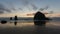 Time lapse of clouds and sky along Pacific Ocean in Cannon Beach lowtide at sunset