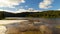 Time lapse of clouds and sky over Mt Rainier with reflection in Washington State