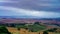 Time lapse with clouds and typical farmhouse in San Quirico d`Orcia in Italy