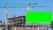 Time lapse construction site and green big billboard