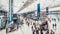 Time-lapse of crowded people walking in Hong Kong airport transit terminal. Air transportation, international tourism