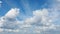 Time lapse cumulus, Cirrostratus and stratocumulus Sc clouds against blue sky. Cloudiness moves lower and faster