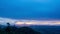 Time lapse dark clouds over mountain small fog flowing in the forest in evening time