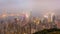 Time Lapse Day To Night Hong Kong City and Mist in Sky From High Viewpoint Of The Peak
