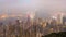 Time Lapse Day To Night Hong Kong City and Mist in Sky From High Viewpoint Of The Peak