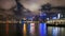 Time lapse of ferry and moving clouds at Ferry Pier in Victoria Harbour, Hong Kong at night. 1080p