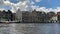 Time lapse footage of people riding boats on Amstel river in Amsterdam.