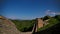 Time-lapse of the Great Wall in China at dawn. The moving stars in the blue sky