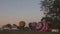 A Time Lapse of Hot Air Balloons Filling Up at a Hot Air Balloon Festival