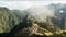 Time lapse of the iconic view of machu picchu on a misty morning