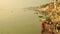 Time lapse Indian pilgrims rowing boat in sunrise. Ganges river at Varanasi India.