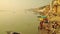 Time lapse Indian pilgrims rowing boat in sunrise. Ganges river at Varanasi India.