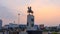 Time lapse of King Taksin statue at Wongwainyai circle in sunset time