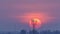 Time lapse of the large orange sunset with antenna, skyline sunrise silhouette with flare.