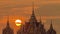Time lapse of the large orange sunset with antenna, skyline sunrise silhouette with flare.