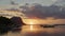 Time lapse: Mauritius at sunset with floating fishing boats on sea, cloudscape tropical weather, colorful sky and