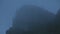 Time lapse of mist covering old stone church on mountain, mysterious atmosphere