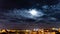 A time-lapse of a moonlit night sky over the spanish town of Benalamdena on the Costa Del Sol