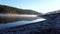 Time lapse of morning mist above a lake during sunrise