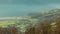 Time lapse Motion. Panoramic view of countryside with railroad, highway, lake and mountains. Canton Schwyz. Switzerland