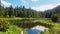 Time lapse mountain, lake, clouds and trees