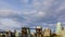 Time lapse of moving clouds and blue sky over Granville Island False Creek ferry dock in Vancouver BC Canada