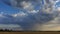 Time Lapse - Moving clouds over a field in summer with Frankfurt am Main in the distance