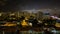 Time lapse of night scene and moving clouds at Joo Chiat with Singapore cityscape.