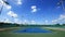 Time-lapse of outdoor empty tennis court with blue sky and cloud