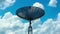 Time lapse of parabolic antenna dish over blue cloudy sky