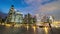 Time-lapse of people walk in business district Marina bay at night, office building view