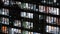 Time lapse of people working late night, office windows view on business center building facade