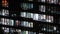 Time lapse of people working late night, office windows view on business center building facade