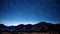 Time   lapse photograph night sky mountain range