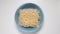 TIME-LAPSE: Preparing a quick noodles in blue bowl top view, square