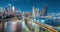 Time-lapse of Qiansimen Jialing River Bridge and building skyline