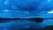 Time lapse on the reservoir, the view of clouds reflecting with the water at sunset