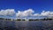 Time lapse of rolling cumulus clouds on a sunny day. Embankment of a Neva river in St. Petersburg, Russia.