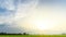 Time-lapse scene of ray of light over rice field