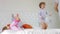 Time Lapse Sequence Of Four Children Playing On Bed