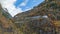 Time lapse, serpentine mountain road. Winding road in mountains. Autumn landscape. Incredible serpentine in the mountains. Silenen