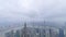 Time lapse of shanghai bund, moving clouds from overcast to blue sky, modern city in air pollution, aerial view of bund skyline