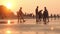 Time lapse . Silhouette of Sae Beach Sunset Time . A group of people enjoying winter or summer vacation at Saint Martin Island