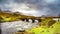 Time lapse of the Sligachan Old stone Bridge over River Sligachan with Beinn Dearg Mhor and Marsco peak of Red Cuillin