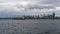 Time lapse of stormy sky over Seattle WA city skyline from Alki Beach 4k UHD